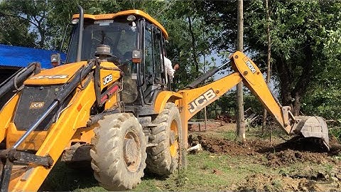 JCB 3DX Clearing Sloping Ground By Removing Trees And Roots - JCB Video