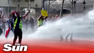 Protesters against covid restrictions in violent clashes with police in Paris