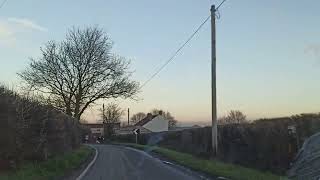 Driving towards West Ham Nature reserve II, at dusk. Somerset, UK, 20/01/22
