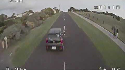 Eachine trashcan chasing cars (stock PIDs)