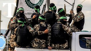 Footage shows Hamas militants taking Israelis hostage