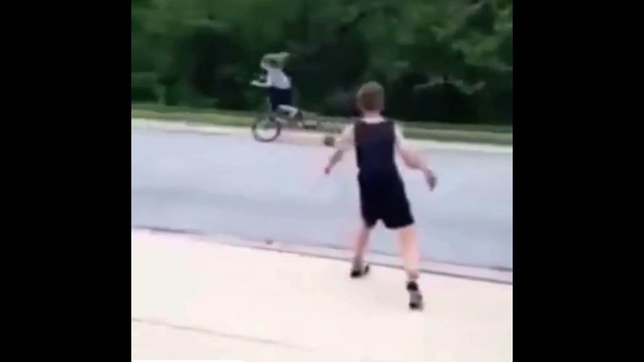 Kid throws basketball at girl riding bike YouTube