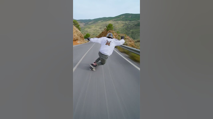 Going full blast at 100km/h into this corner   ! #downhill #speed #longboard #skate