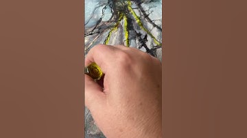 Using alcohol inks to enhance painting, adding a pop of colour