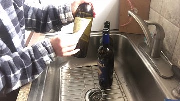Removing bottle labels without ripping them.