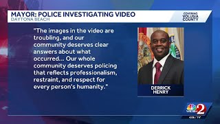 Investigation underway after video surfaces of Daytona Beach police officer punching a handcuffed...