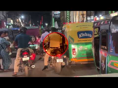 পুলিশ কর্মীর মাথায় নেই হেলমেট এখন কে করবে জরিমানা | Planet Tripura News