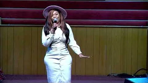 Lady Precious Cullins singing In The Name of Jesus...