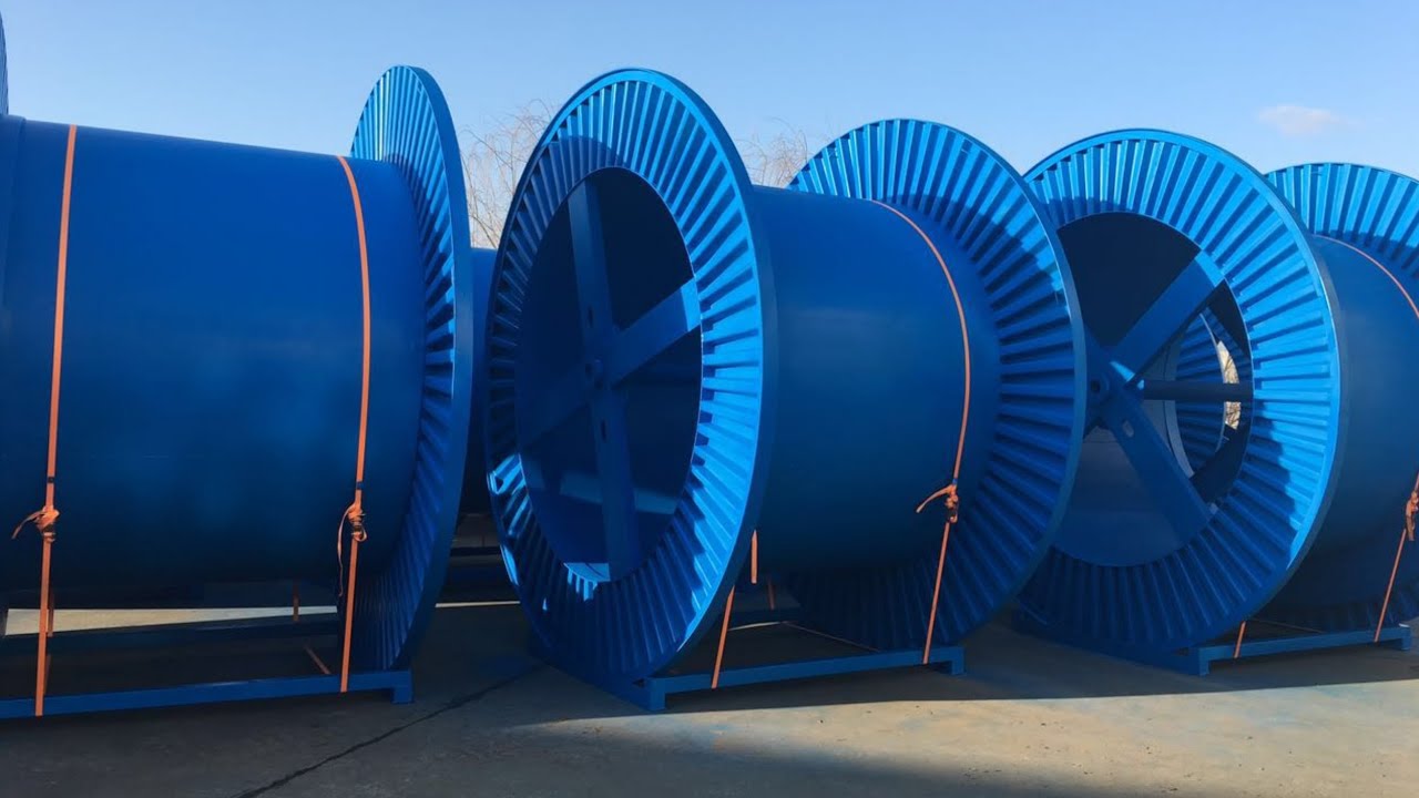Bobbins loading into container - YouTube