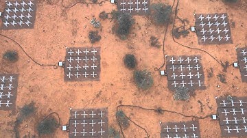 Aerial view of the Murchison Widefield Array (MWA): approaching core & climbing high at dusk
