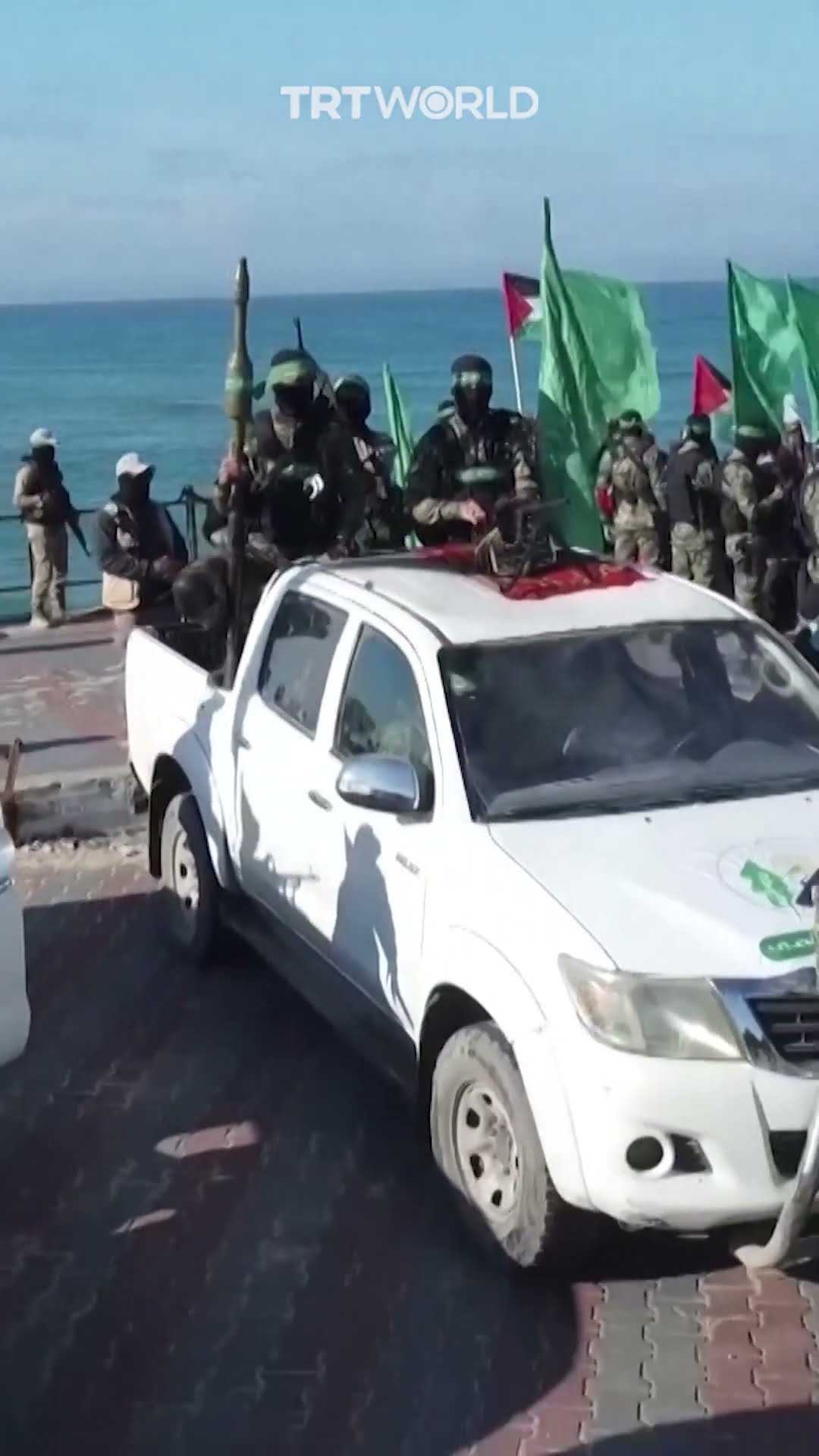 Drone footage shows hostage handover by the sea in Gaza