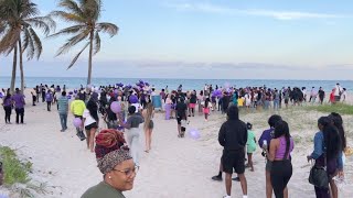 Woman killed by ex-boyfriend honored with beachside vigil