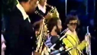 Peggy - Kustbandet with Benny Carter 1980
Peggy Carter 1980
Benny Carter in Sweden
Kustbandet is a big band from the Stockholm area of Sweden. They play in the style of the late twenties and the thirties and do it better than any band Ive ever heard. Initially under the leadership of reedplayer Kenneth Arnstrom they started in 1965 or 66 ar the Detta Kust Band. In 1969 the name was changed to Kustbandet and today, the band, with many of the same musicians from the seventies are still playing festivals and concerts all over the world.
These clips are from a midnight concert in the summer of 1980 and the band has Carter as a special guest.
Benny, (1907-2003) played in the late twenties with Don Redmans McKinneys Cottonpickers and started his own band in 1932.
While with the Cottonpickers a recording was made in 1929 of a tune called Peggy. Kustbandet plays Peggy again some 50 years later, and Benny with his alto sax just fits in if he has been playing this tune yesterday. Brilliant! Peggy - Kustbandet with Benny Carter 1980