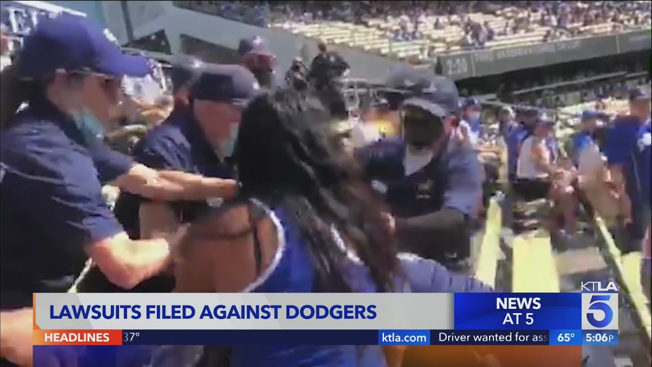 Dodgers fans fight back tears • The Associated Press