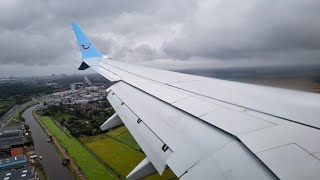 TUIfly Boeing 737MAX 8  rainy landing at Amsterdam