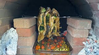 Baked fish Trout in a brick oven                      | سمك مشوي في فرن الحطب | السمك المعلق 