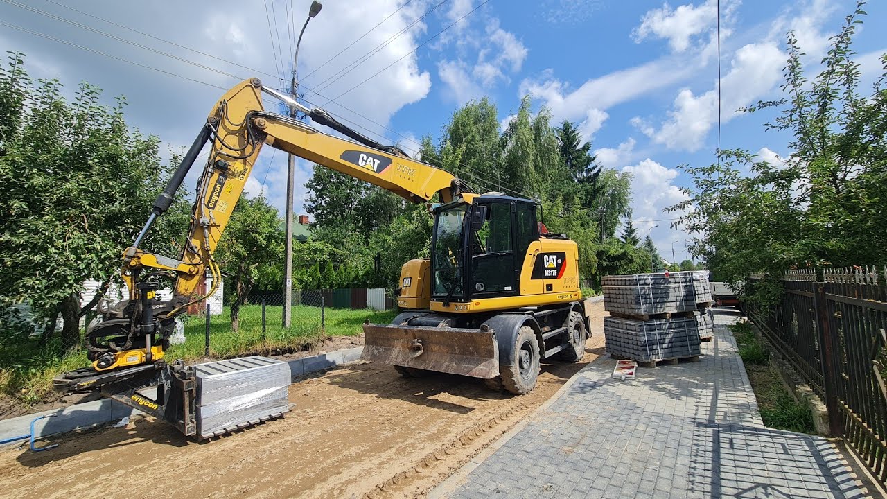 Ustawianie krawężnika | Cat M317F tiltrotator Engcon