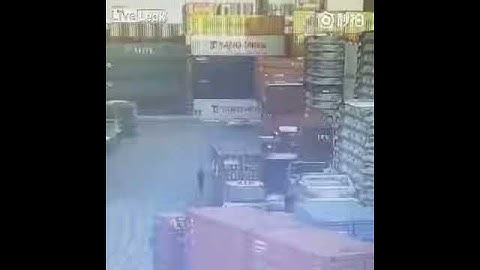 Containers Falls on Loading Dock, Crushing a Car