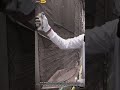 Skilled Worker Applies Cement Plaster For Smooth Wall Finishing