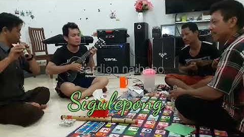 Bermusik dengan Gitar,Sulim,Kecapi,dan Botol bir