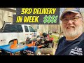 Firewood  splitting campfire wood into truck bed