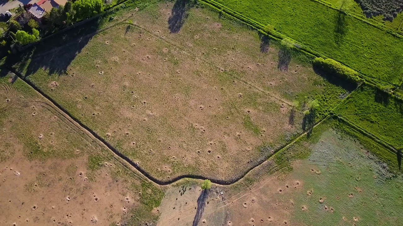 Water rights, well share, & sweeping mountain views make this home site