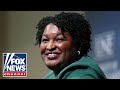 Stacey Abrams deletes tweet after blowback over maskless photo