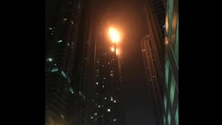 Dubai tower engulfed in flames