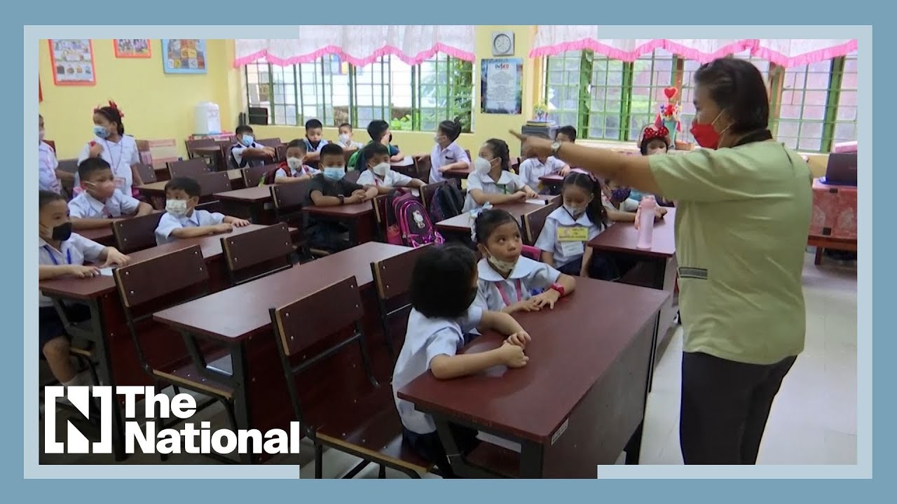 Pupils return to classrooms in Philippines after two years - YouTube