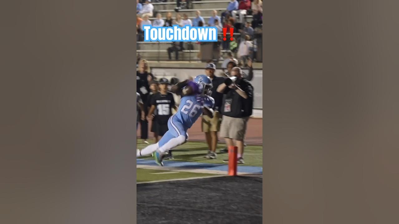 Fingertip grab and lunge into the end zone for the score. shorts 