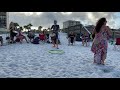Drum Circle on Jacksonville Beach Facilitator Stanislav Shaposhnikov