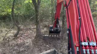 Kubota kx0404 chain on rake