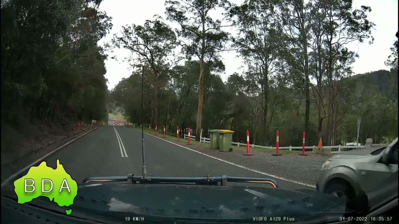 BAD Driving Australia - Subaru driver overtakes turning vehicle in 🚧  ROADWORKS ZONE 🚧