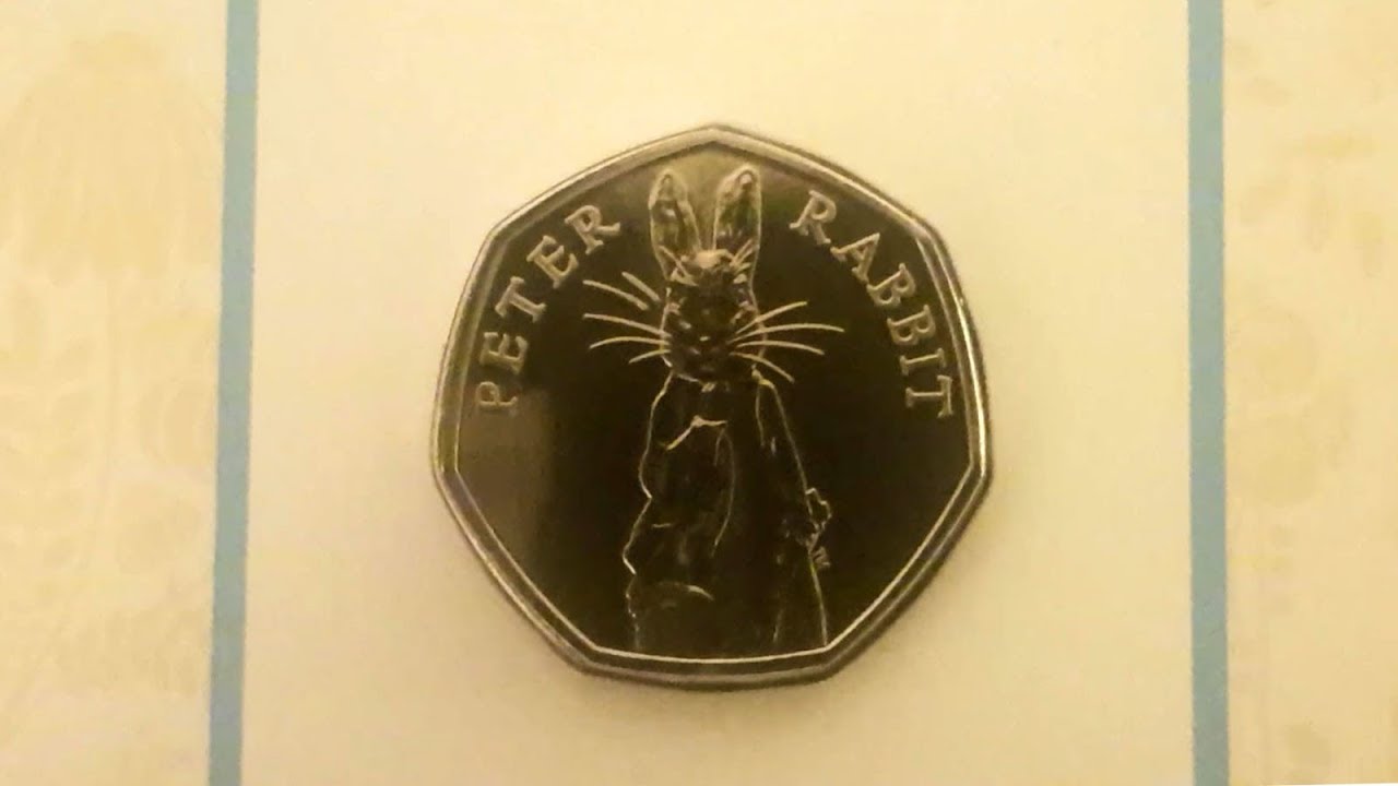 Unboxing a few 50 pences and filling up the 2019 10p albums