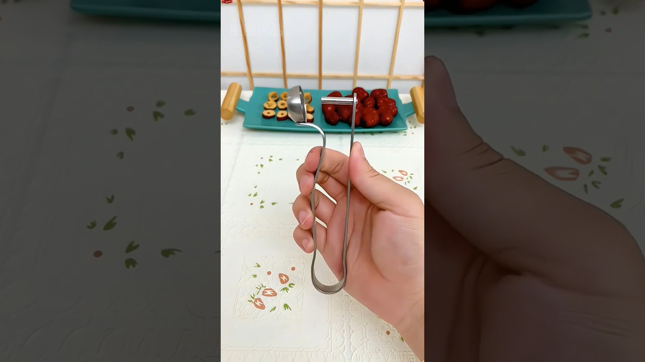 This red date pit removal tool is so easy to use, made of stainless steel 