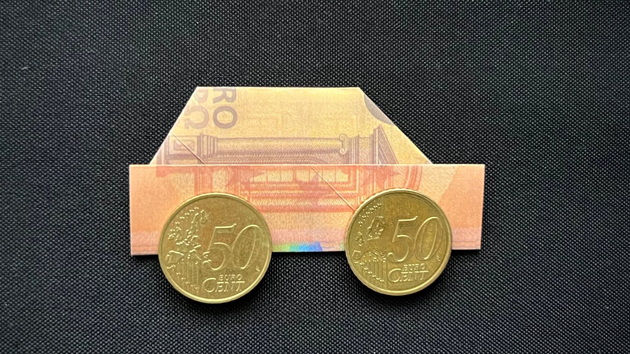 Verwunderlich Auto Falten Geld Bildnull