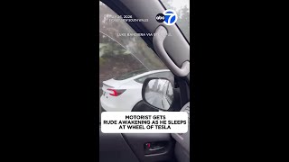 Motorist gets rude awakening as he sleeps at wheel of Tesla
