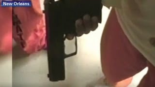 See inmates play with guns and drugs