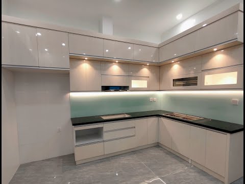 Video Thi công lắp đặt bộ tủ bếp nhựa phủ laminate tại Hải... - youtube