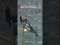 Caught on camera: Two people scale Empire State Building spire