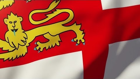 4K Sark flag waving in the wind. Looping sun rises style. Animation loop Stock video