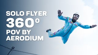 Wind tunnel solo flyer with 360 degree view