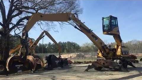 2007 Caterpillar M318D MH with 5 tine scrap grapple