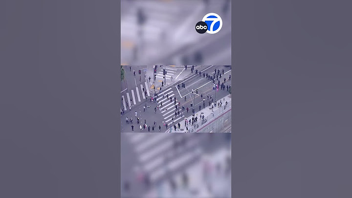 LAPD issues dispersal order as hundreds of protesters rally in downtown LA following ICE raids