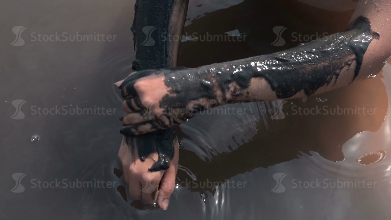 Applying therapeutic mud from salty lake