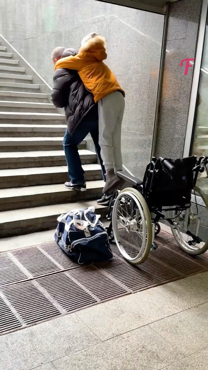 Everyone Ignored a Father Carrying His Disabled Child Until a Stranger Helped #shorts