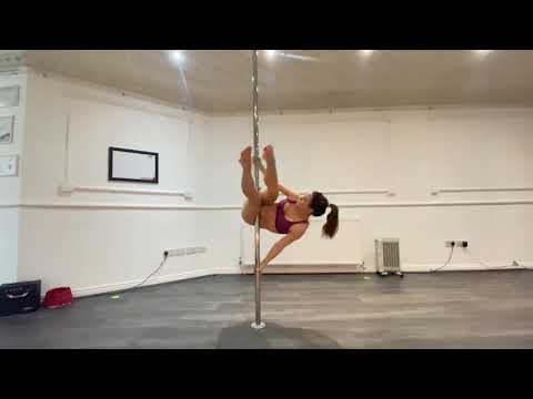 Transitions into superman Pole trick