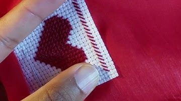 Affixing heart cross stitch