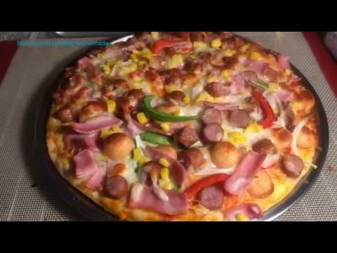 Video: Sådan Laver Du En Pizza Med Pølse Og Ost