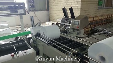 Automatic maxi roll heat shrink packing machine with auto labelling